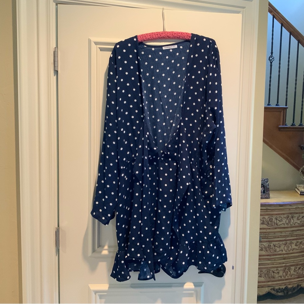 Women’s romper with tie front.